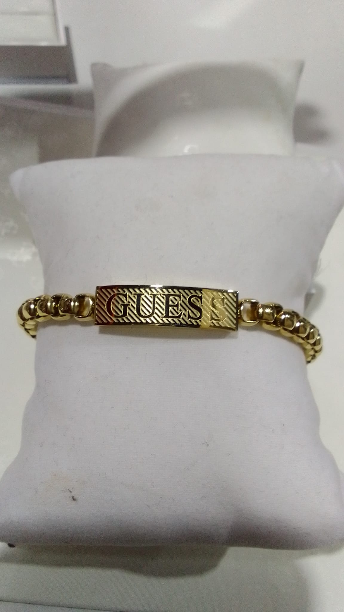 pulsera guess hombre oro