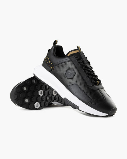 bambas negras cruyff con detalles dorados